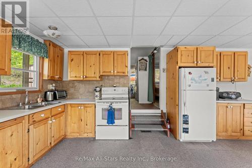 55 Fire Route 393, Trent Lakes, ON - Indoor Photo Showing Kitchen With Double Sink