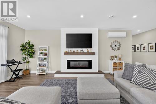 6-14A Drover'S Road, Upper Island Cove, NL - Indoor Photo Showing Living Room With Fireplace
