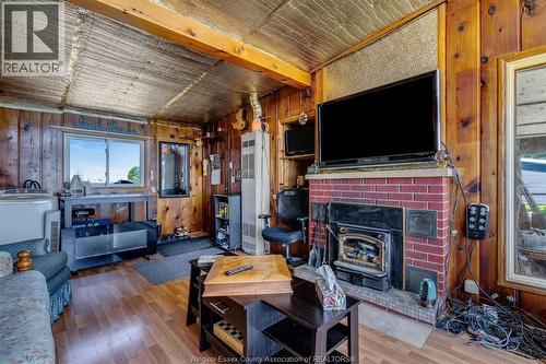 1624 Tilton Line, Wheatley, ON - Indoor With Fireplace