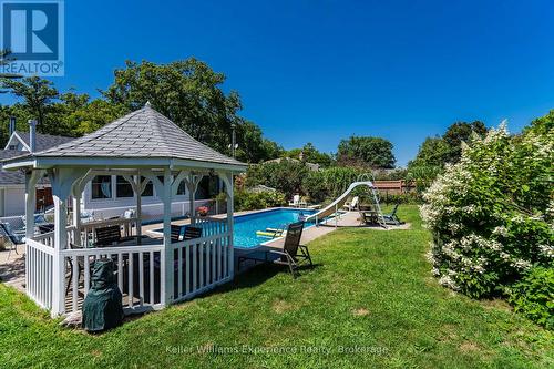 63 Lorne Avenue, Penetanguishene, ON - Outdoor With In Ground Pool With Deck Patio Veranda With Backyard