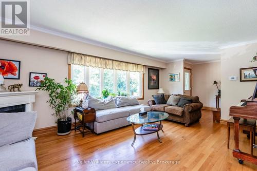 63 Lorne Avenue, Penetanguishene, ON - Indoor Photo Showing Living Room With Fireplace
