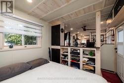 Bedroom with built in shelves - 