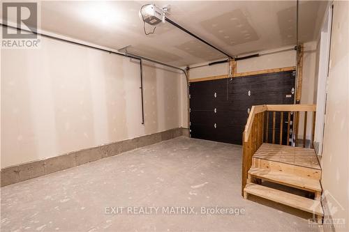 Imported from oreb - 9 Glenco Road, South Stormont, ON - Indoor Photo Showing Garage