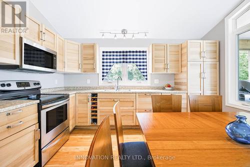 688 Dewitt Lane, Frontenac (Frontenac South), ON - Indoor Photo Showing Kitchen With Double Sink