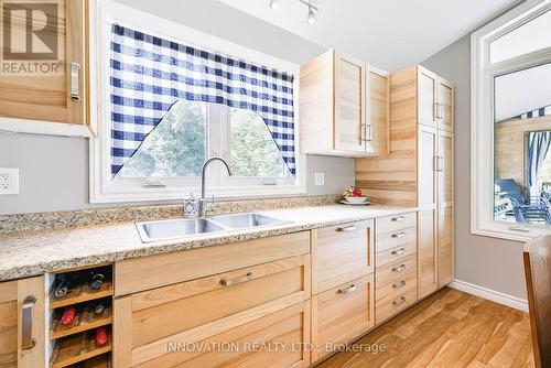 688 Dewitt Lane, Frontenac (Frontenac South), ON - Indoor Photo Showing Kitchen With Double Sink