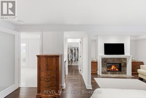 14 - 275 Pelham Road, St. Catharines (Rykert/Vansickle), ON - Indoor Photo Showing Living Room With Fireplace
