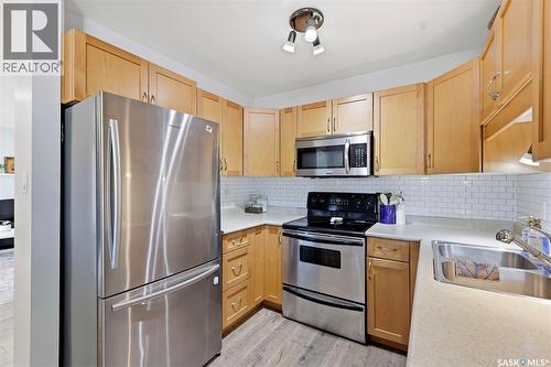 123 Appleby Drive, Saskatoon, SK - Indoor Photo Showing Kitchen With Stainless Steel Kitchen With Double Sink