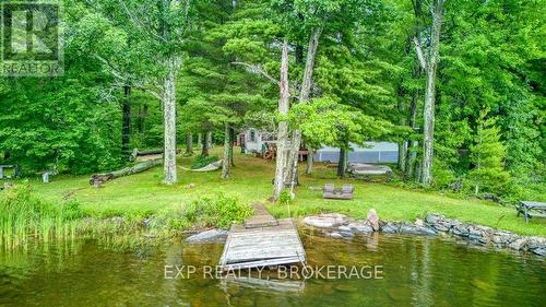 148B Oak Shores Lane, Frontenac (Frontenac South), ON - Outdoor With Body Of Water