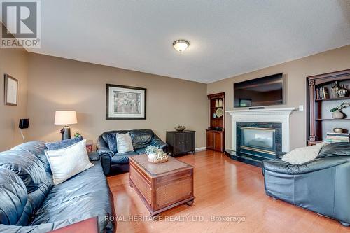 1451 Ravensmoor Crescent, Mississauga, ON - Indoor Photo Showing Living Room With Fireplace