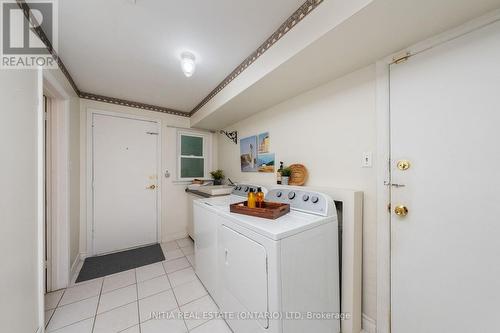Laundry w walkout to backyard & access to garage. - 1732 Rutherglen Close, Sarnia, ON - Indoor Photo Showing Laundry Room