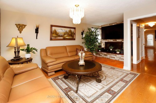 690 Ashprior Avenue, Mississauga, ON - Indoor Photo Showing Living Room With Fireplace