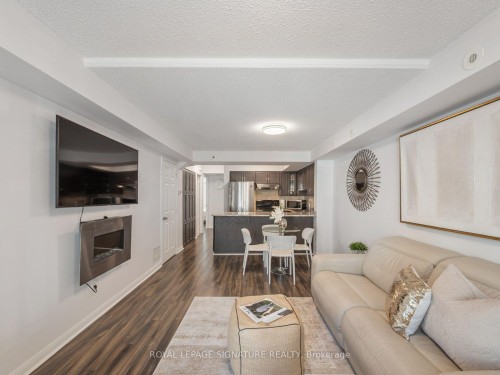 2067-65 George Appleton Way, Toronto, ON - Indoor Photo Showing Living Room With Fireplace