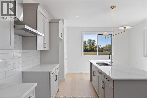 109 Erie Isle Court, Amherstburg, ON - Indoor Photo Showing Kitchen With Double Sink