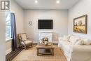 Virtually Staged Living Room - 31 Givins Street, Woodstock (Woodstock - North), ON  - Indoor Photo Showing Living Room 