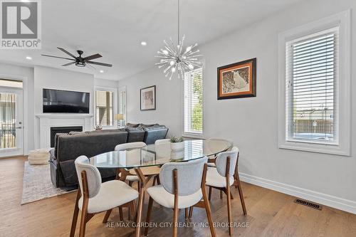 54 Borden Trail, Welland (Prince Charles), ON - Indoor Photo Showing Dining Room With Fireplace