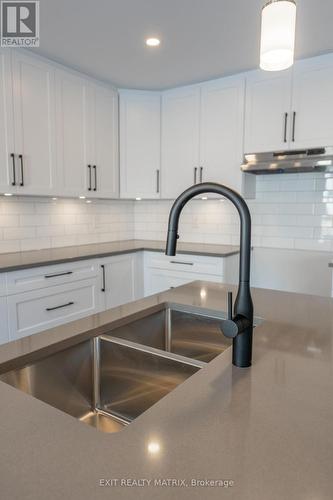14 Glenco Road, South Stormont, ON - Indoor Photo Showing Kitchen With Double Sink
