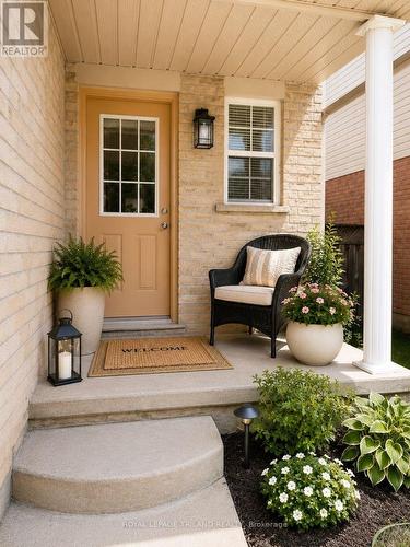 Virtually Staged covered front porch - 1942 Bloom Crescent, London North (North C), ON - Outdoor With Exterior