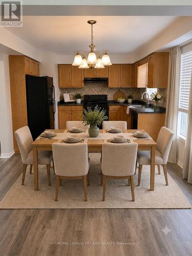 Virtually staged kitchen & dining room - 1942 Bloom Crescent, London North (North C), ON - Indoor Photo Showing Dining Room