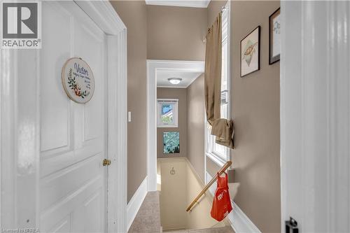 Interior hallway with neutral tone walls and white trim - 17 Scarfe Avenue, Brantford, ON - Indoor Photo Showing Other Room