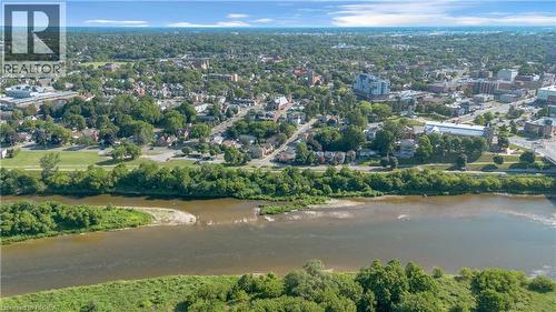 Aerial perspective showcasing a riverfront setting with surrounding urban and suburban development - 17 Scarfe Avenue, Brantford, ON - Outdoor With Body Of Water With View