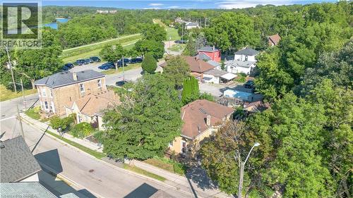 Aerial perspective showcasing a mixed residential and commercial streetscape with mature trees - 17 Scarfe Avenue, Brantford, ON - Outdoor With View