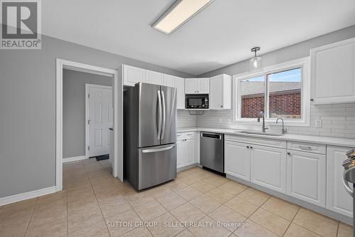 NEWER STAINLESS-STEEL FRIDGE - 2021 Lumb Court, London North (North R), ON - Indoor Photo Showing Kitchen