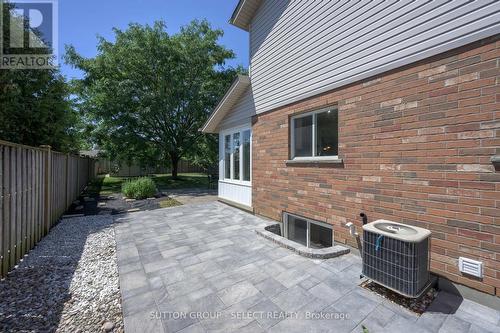 SIDE VIEW OF STONE PATIO - 2021 Lumb Court, London North (North R), ON - Outdoor With Exterior