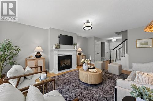 GREAT ROOM WITH FIREPLACE - 2021 Lumb Court, London North (North R), ON - Indoor Photo Showing Living Room With Fireplace