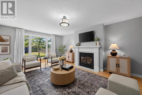BEAUTIFUL AND TRANQUIL - 2021 Lumb Court, London North (North R), ON - Indoor Photo Showing Living Room With Fireplace