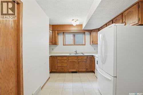 238 S Avenue N, Saskatoon, SK - Indoor Photo Showing Kitchen With Double Sink