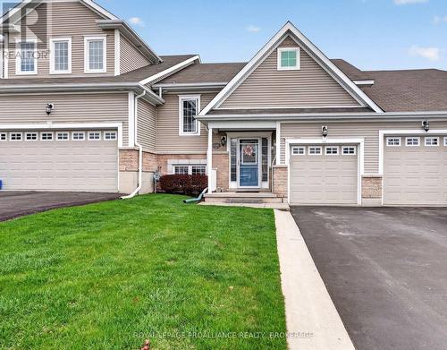 146 Britannia Crescent, Loyalist (Bath), ON - Outdoor With Facade