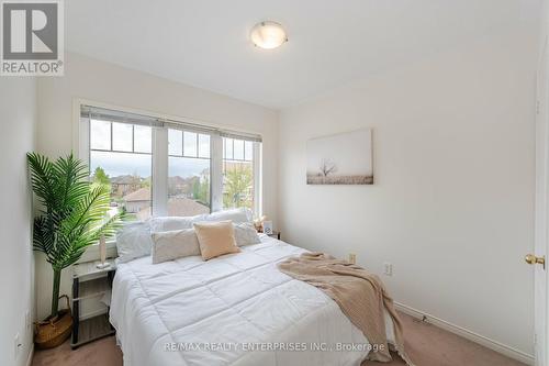 Third Bedroom with Large Windows Facing Back - 3,4 - 3375 Thomas Street, Mississauga, ON - Indoor Photo Showing Bedroom