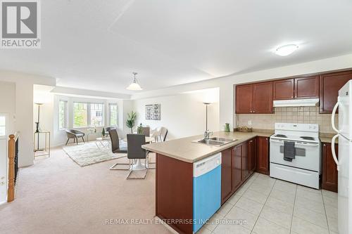 Open Concept Kitchen with Great Natural Light - 3,4 - 3375 Thomas Street, Mississauga, ON - Indoor Photo Showing Kitchen With Double Sink