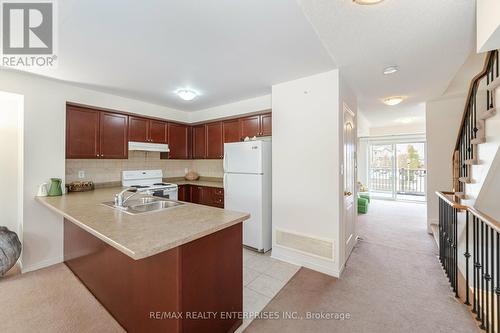 Open Concept Kitchen with Great Natural Light - 3,4 - 3375 Thomas Street, Mississauga, ON - Indoor Photo Showing Kitchen