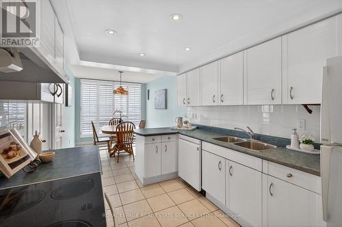 1601 - 2180 Marine Drive, Oakville, ON - Indoor Photo Showing Kitchen With Double Sink