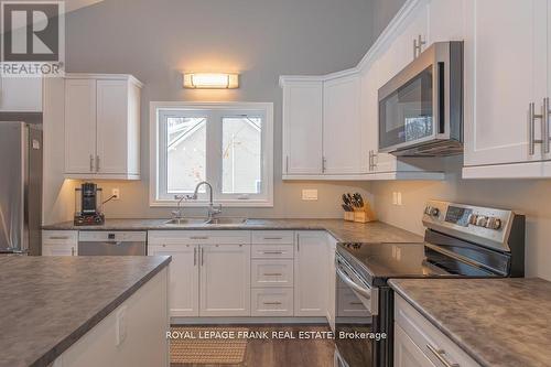 24 Ted'S Lane, Trent Lakes, ON - Indoor Photo Showing Kitchen With Stainless Steel Kitchen With Double Sink