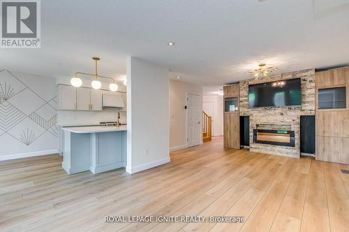 64 Templewood Drive, Kitchener, ON - Indoor Photo Showing Other Room With Fireplace