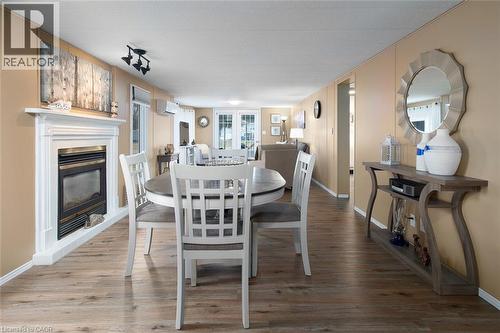 580 Beaver Creek Road Unit# 189, Waterloo, ON - Indoor Photo Showing Dining Room With Fireplace