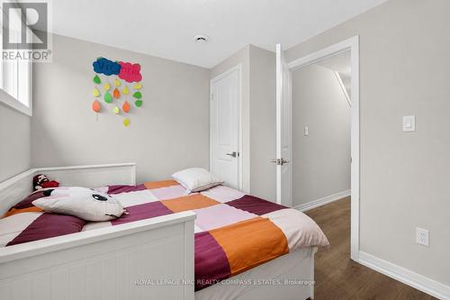 119 - 6705 Cropp Street, Niagara Falls (Morrison), ON - Indoor Photo Showing Bedroom