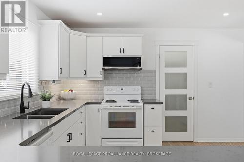 4318 County Road 6, Stone Mills (Stone Mills), ON - Indoor Photo Showing Kitchen With Double Sink