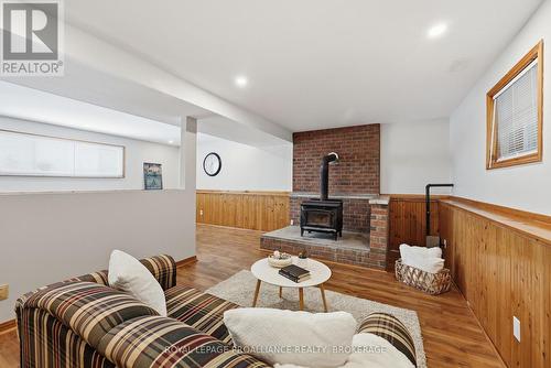 4318 County Road 6, Stone Mills (Stone Mills), ON - Indoor Photo Showing Living Room With Fireplace