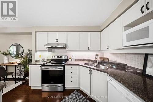 21 - 5530 Glen Erin Drive, Mississauga, ON - Indoor Photo Showing Kitchen With Double Sink