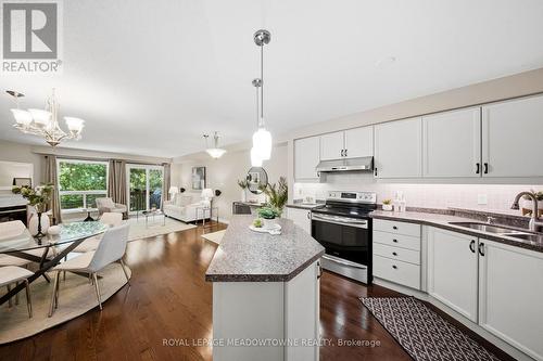 21 - 5530 Glen Erin Drive, Mississauga, ON - Indoor Photo Showing Kitchen With Double Sink