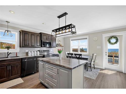 13 The Green Road, Upper Island Cove, NL - Indoor Photo Showing Kitchen With Double Sink