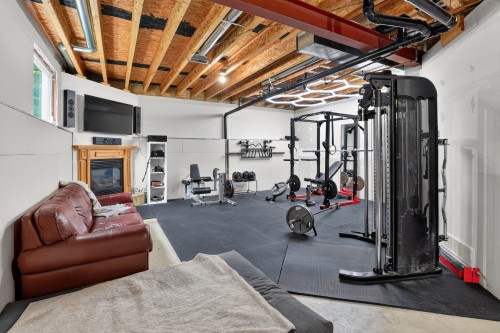 Salle familiale - 727 Ch. Edelweiss, La Pêche, QC - Indoor Photo Showing Gym Room