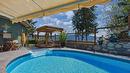 594 Mountain Drive, Vernon, BC  - Outdoor With In Ground Pool With Deck Patio Veranda 