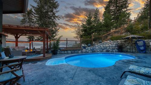 594 Mountain Drive, Vernon, BC - Outdoor With In Ground Pool With Deck Patio Veranda