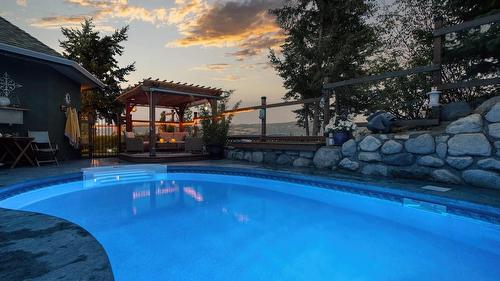 594 Mountain Drive, Vernon, BC - Outdoor With In Ground Pool With Deck Patio Veranda