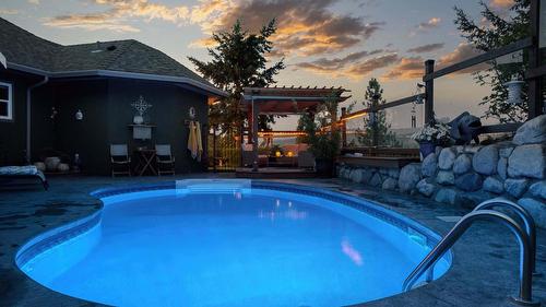 594 Mountain Drive, Vernon, BC - Outdoor With In Ground Pool With Deck Patio Veranda
