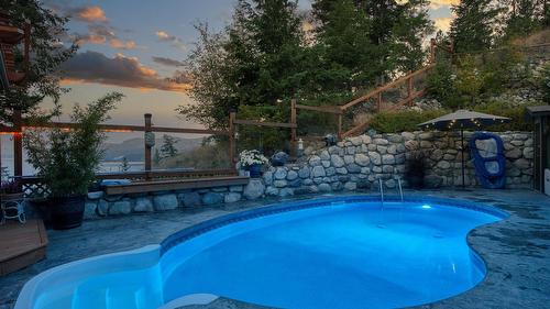 594 Mountain Drive, Vernon, BC - Outdoor With In Ground Pool With Deck Patio Veranda